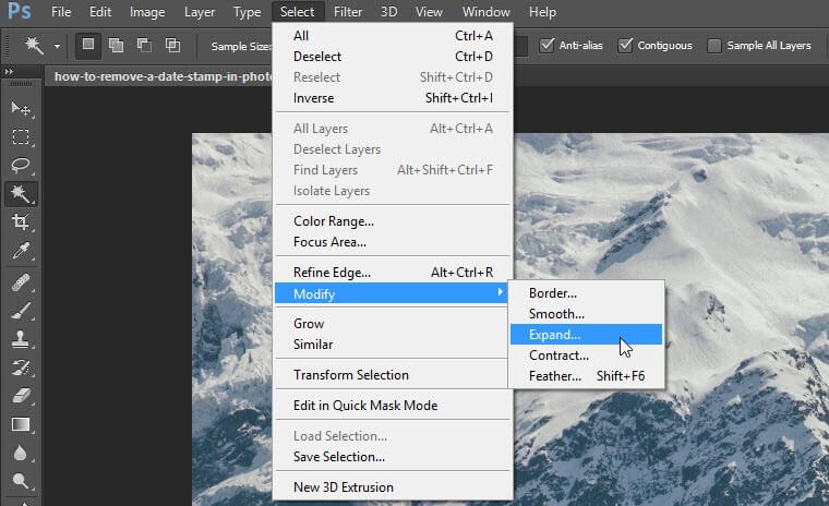 Photoshop rimuove i timbri di data e ora